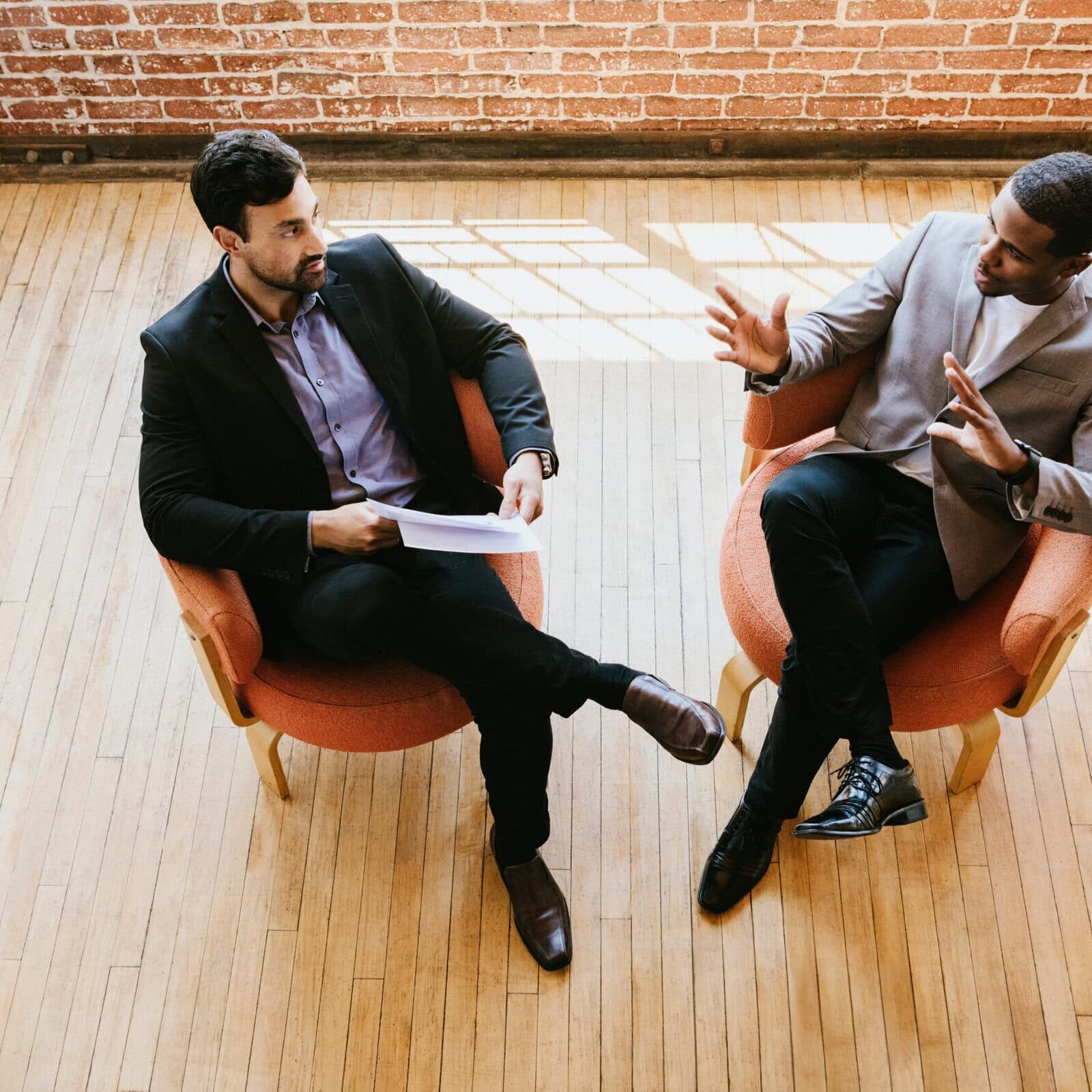 Businessman in an interview ICF membership supporting all levels of coaching professionals.